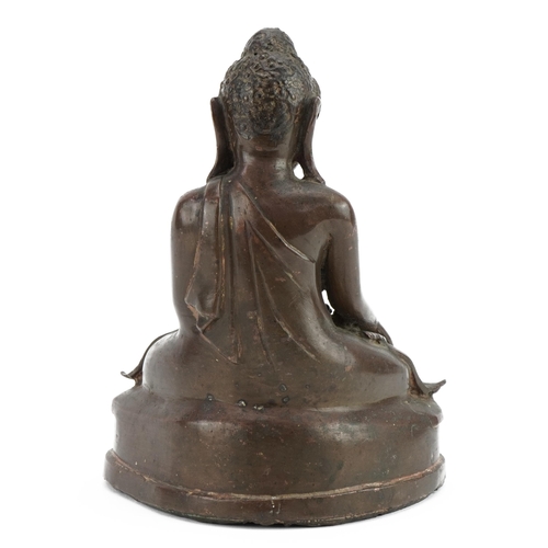 336 - Chino Tibetan patinated bronze figure of Buddha, 16cm high