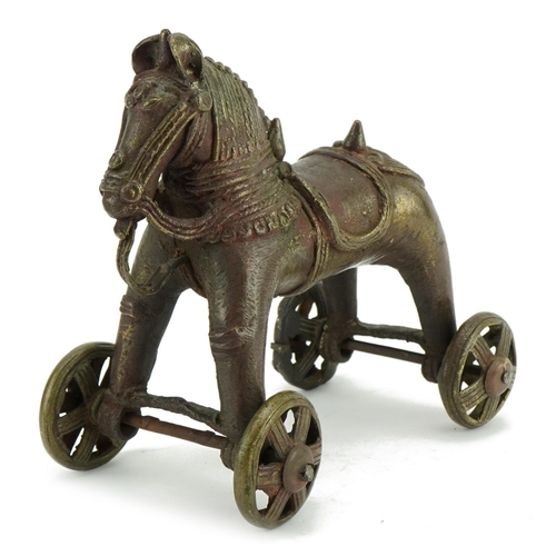 1492 - Chinese patinated bronze push along horse, 18cm high