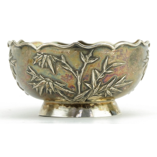 18 - Chinese export silver footed bowl decorated in relief with birds amongst bamboo grove, indistinct ma... 