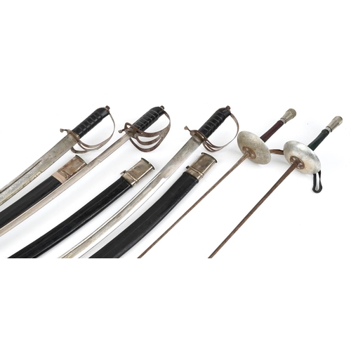 Three decorative steel bladed swords with scabbards and two fencing
