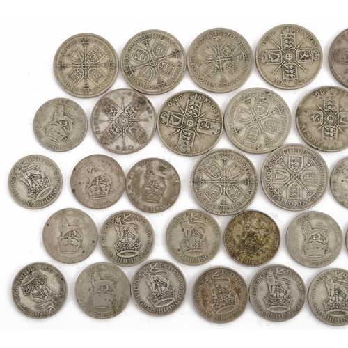 634 - Collection of George V pre 1947 British florins and shillings, 269.0g