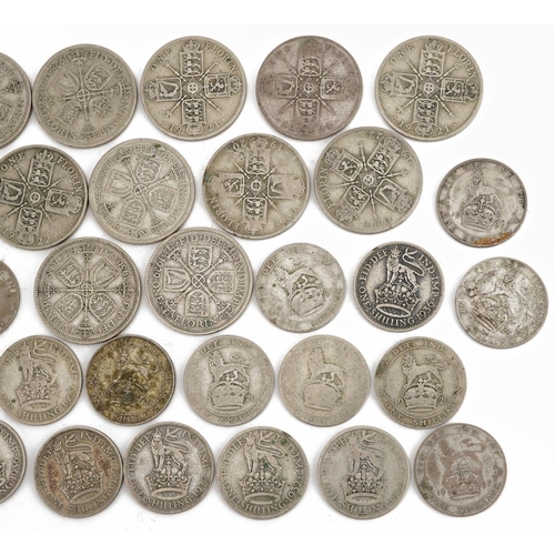 634 - Collection of George V pre 1947 British florins and shillings, 269.0g