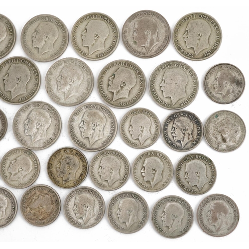 634 - Collection of George V pre 1947 British florins and shillings, 269.0g