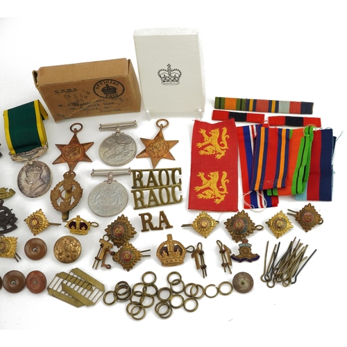 812 - British military World War I and later militaria including George VI Territorial Efficient Service m... 