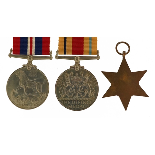 813 - Three British military World War II medals with box issue inscribed T A Ward Esq