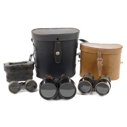 860 - Three pairs of vintage binoculars with cases including marine, field and theatre examples