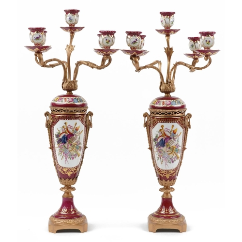 274 - Manner of Sevres, pair of continental porcelain five branch candelabras with gilt bronze mounts, eac... 