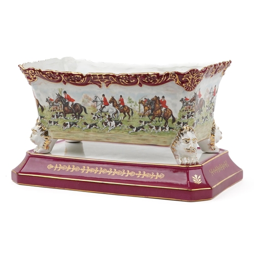 1490 - Continental porcelain four footed planter on stand decorated with huntsmen and huntswomen on horseba... 