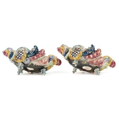 306 - Zsolnay Pecs, pair of Hungarian piece shell shaped baskets hand painted with flowers, each stamped F... 