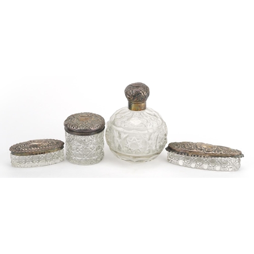 1355 - Four cut glass dressing table items with silver mounts including globular scent bottle and cylindric... 