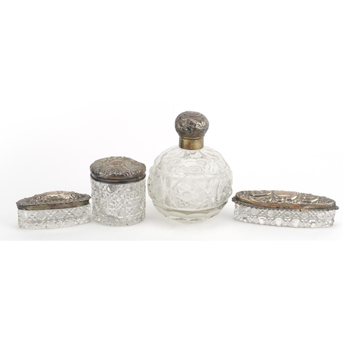 1355 - Four cut glass dressing table items with silver mounts including globular scent bottle and cylindric... 