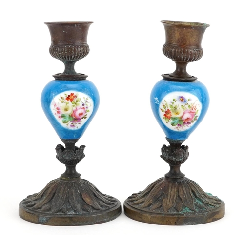 1351 - Pair of French style bronze candlesticks with Sevres type porcelain columns hand painted with flower... 