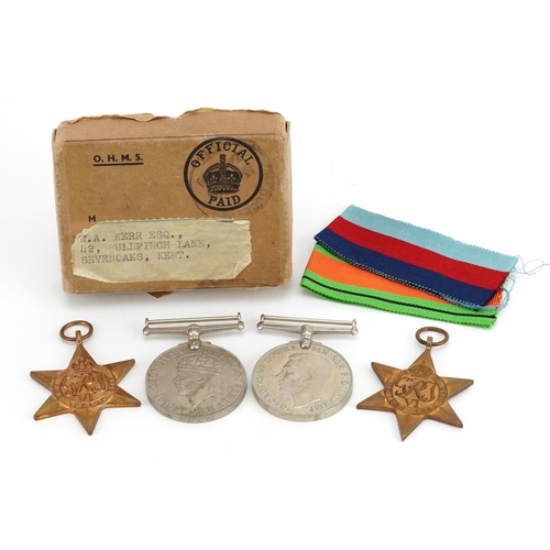 817 - Three British military World War II medals and box of issue inscribed W A Kerr Esq