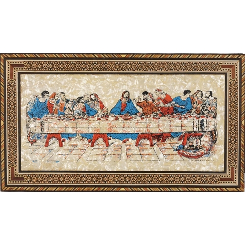 1728 - Mother of pearl plaque depicting The Last Supper housed in a Vizagapatam frame, overall 45.5cm x 25.... 