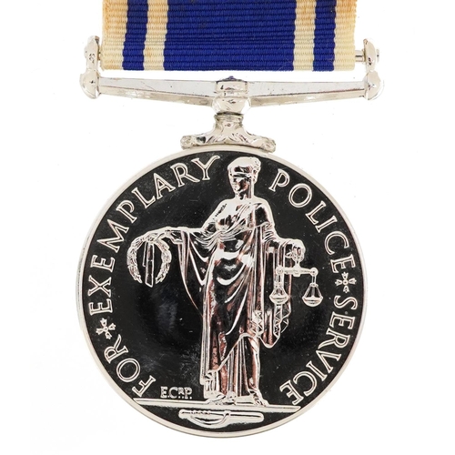 823 - Elizabeth II Police Long Service & Good Conduct medal with box awarded to Const John E Phillips