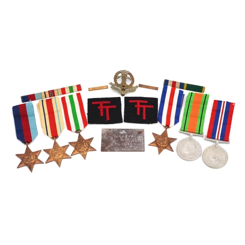 808 - British military World War II six medal group with Middlesex Regiment cap badge and plaque engraved ... 