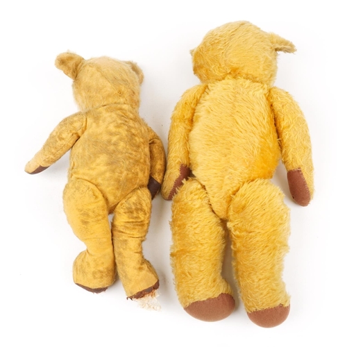 1610 - Two vintage golden teddy bears with jointed limbs, the largest 55cm high