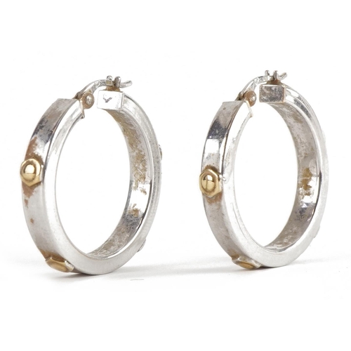 2110 - Pair of 9ct two tone gold Cartier style hoop earrings, 2.5cm in diameter, 3.8g