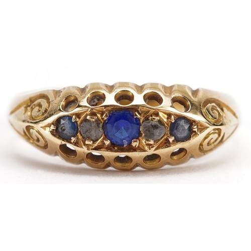 2117 - 18ct gold blue stone and diamond boat ring, the largest blue stone approximately 2.6mm in diameter, ... 