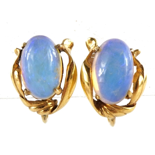 2038 - Pair of 14k gold cabochon opal earrings with screw backs, each opal approximately 11mm x 6.7mm, 1.5c... 