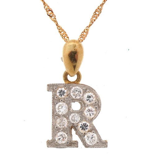 2120 - 9ct gold cubic zirconia initial R pendant on 9ct gold rope twist necklace, 2.1cm high, 40cm in lengt... 