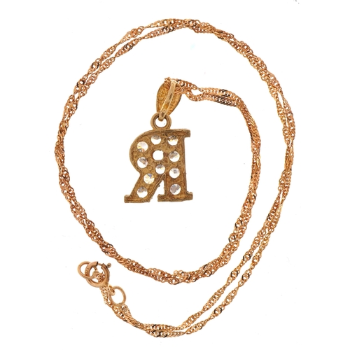 2120 - 9ct gold cubic zirconia initial R pendant on 9ct gold rope twist necklace, 2.1cm high, 40cm in lengt... 