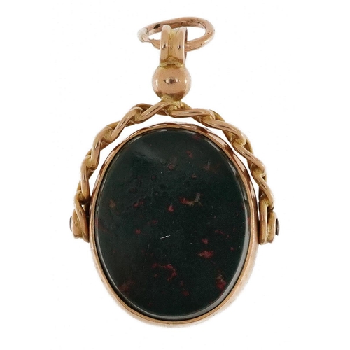 2122 - 9ct rose gold bloodstone spinner seal fob, 2.6cm high, 4.7g