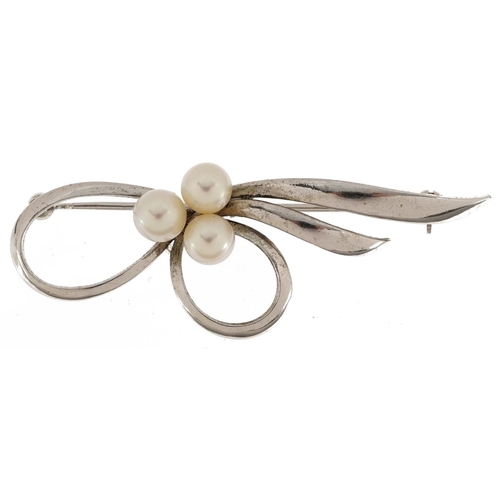 2067 - Mikimoto silver cultured pearl floral spray brooch housed in a Mikimoto velvet box, 5.3cm wide, 4.1g