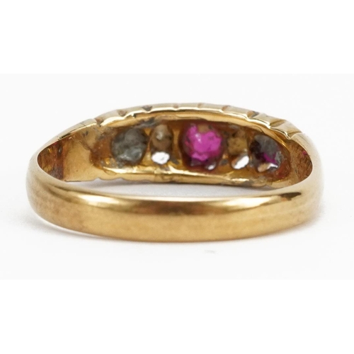 2039 - 18ct gold ruby and diamond five stone ring, the largest ruby approximately 3.7mm in diameter, indist... 