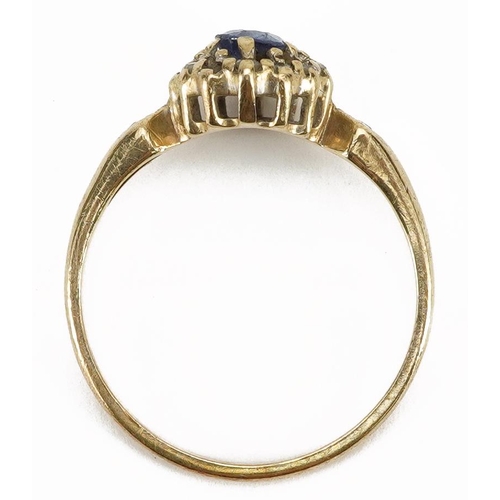 2144 - Unmarked gold sapphire and diamond cluster ring with diamond set shoulders, the sapphire approximate... 