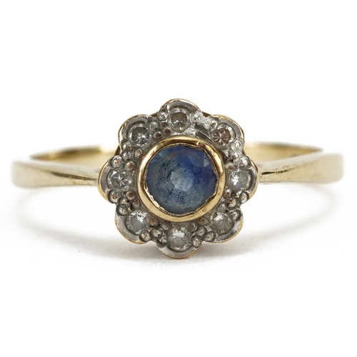 2141 - 9ct gold sapphire and diamond flower head ring, the sapphire approximately 3.5mm in diameter, size P... 