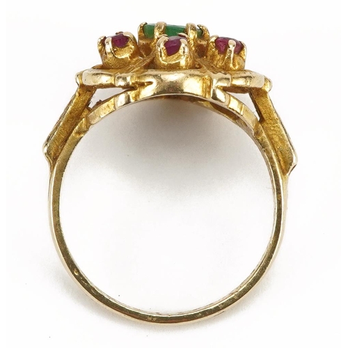 2049 - 9ct gold emerald and ruby flower head ring, the emerald approximately 4.9mm in diameter, size O, 4.6... 