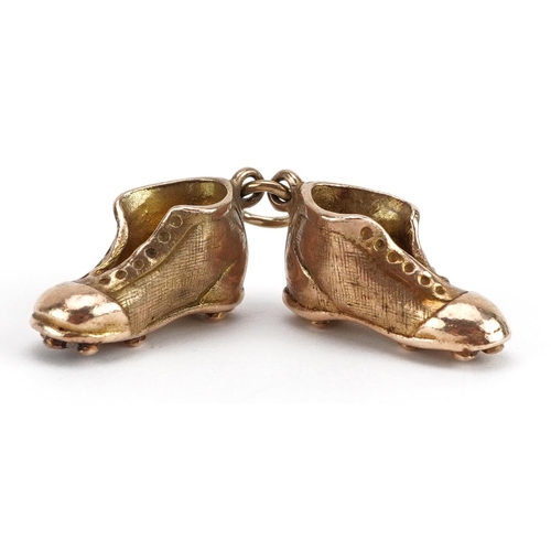 2091 - 9ct gold football boots charm, 1.7cm wide, 7.2g