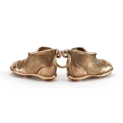 2091 - 9ct gold football boots charm, 1.7cm wide, 7.2g