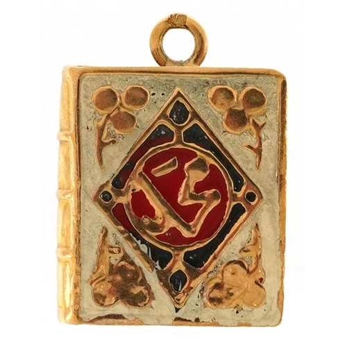 2150 - Gold enamel Koran book charm, the suspension loop indistinctly marked, 1.7cm high, 0.8g