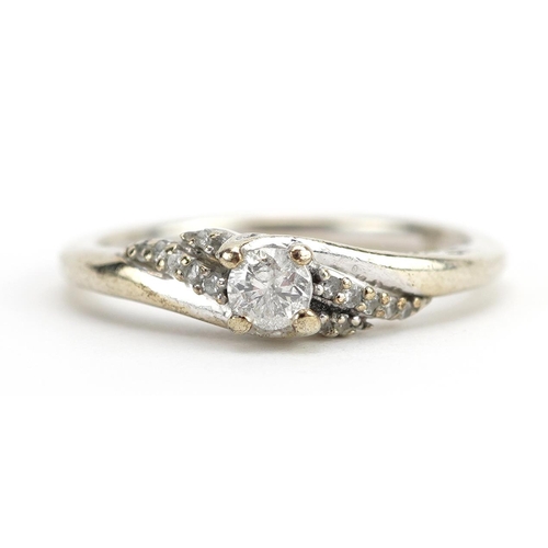 2082 - 9ct white gold diamond solitaire ring with diamond set shoulders, the band stamped 0.25 carat, size ... 