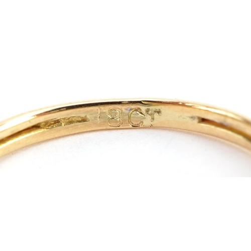 2102 - 18ct gold diamond three stone ring, the largest diamond approximately 0.20 carat, size I, 2.0g
