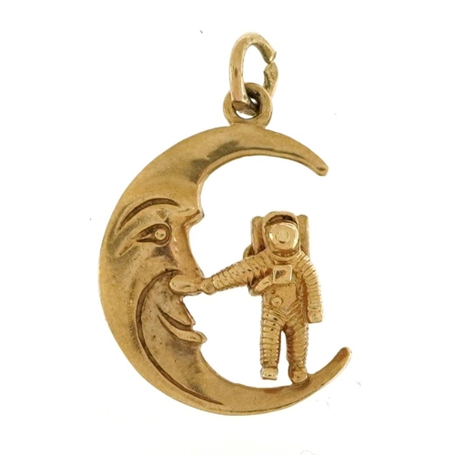 2164 - 9ct gold man on the moon charm, 2.2cm high, 2.7g