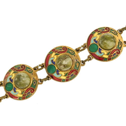 2075 - Arts & Crafts brass and enamel bracelet set with cabochon green hardstones, 19cm in length, 27.0g