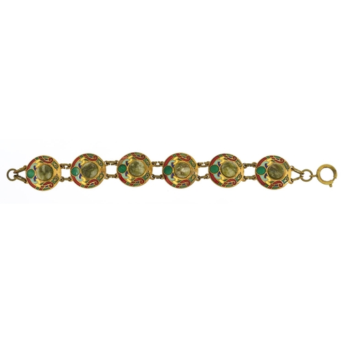 2075 - Arts & Crafts brass and enamel bracelet set with cabochon green hardstones, 19cm in length, 27.0g