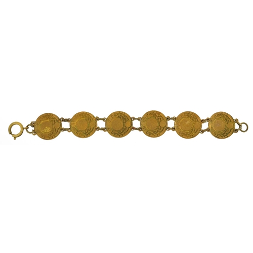 2075 - Arts & Crafts brass and enamel bracelet set with cabochon green hardstones, 19cm in length, 27.0g
