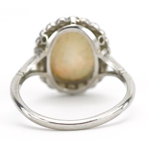2001 - Platinum cabochon opal and diamond cluster ring housed in a Mappin & Webb Ltd tooled leather box, th... 