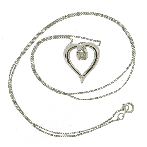 2130 - 9ct white gold love heart pendant set with a diamond on 9ct white gold curb link necklace, the diamo... 