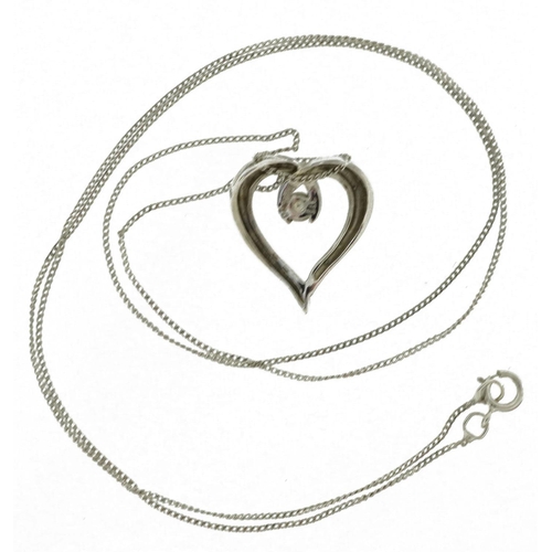 2130 - 9ct white gold love heart pendant set with a diamond on 9ct white gold curb link necklace, the diamo... 