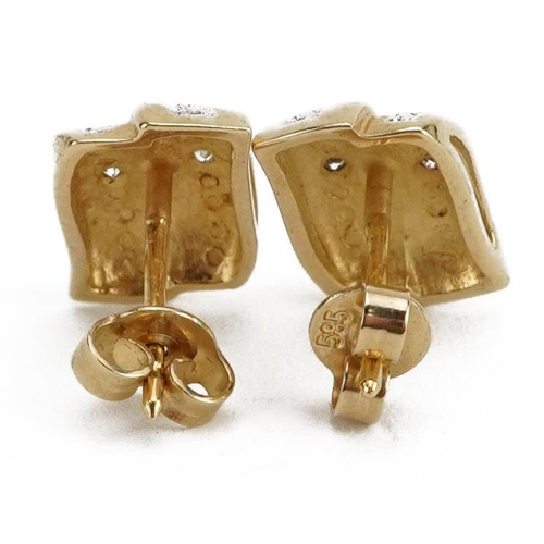 2152 - Pair of 9ct gold diamond two row stud earrings, the butterflies marked 585, 1.2cm high, 2.7g