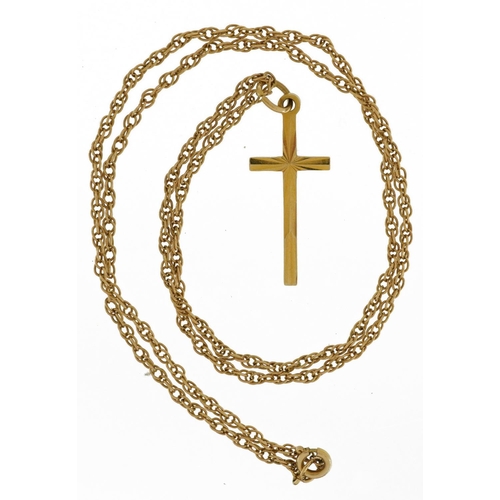 2162 - 9ct gold cross pendant on 9ct gold necklace, 2.6cm high and 42cm in length, total 3.4g