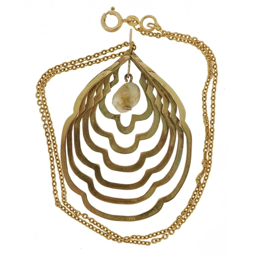 2004 - Large unmarked gold graduated pendant set with a freshwater pearl on an 18ct gold Belcher link neckl... 