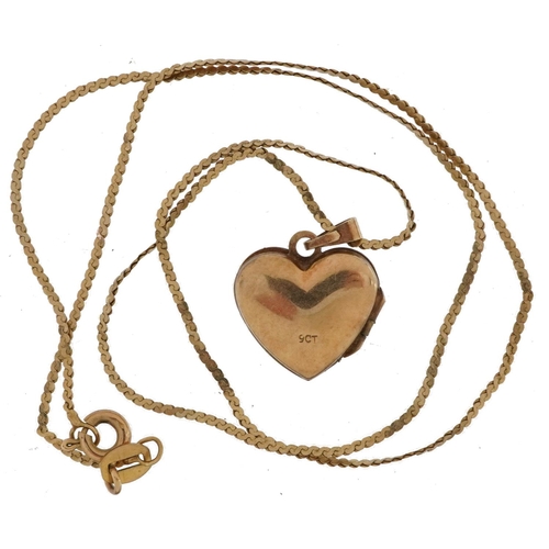 2105 - 9ct gold love heart locket with engraved decoration on a 9ct gold necklace, 1.7cm high and 40cm in l... 