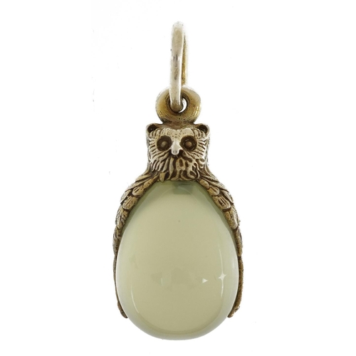 2134 - Silver mounted jade egg pendant in the form of an owl, impressed Russian marks, 3cm high, 5.4g