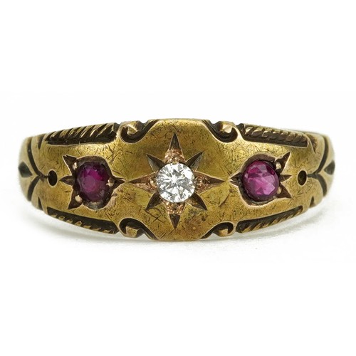 2064 - Victorian 15ct gold ruby and diamond three stone ring housed in a tooled leather box, the diamond ap... 